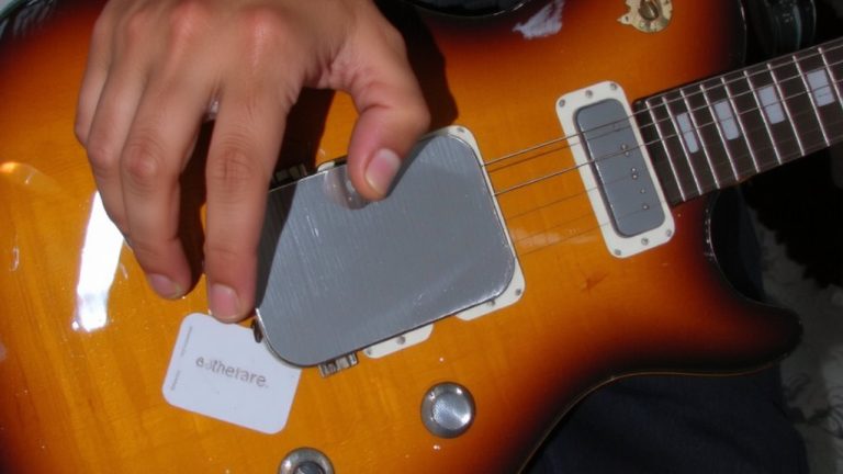 chrome shielded pickup covers reduce feedback